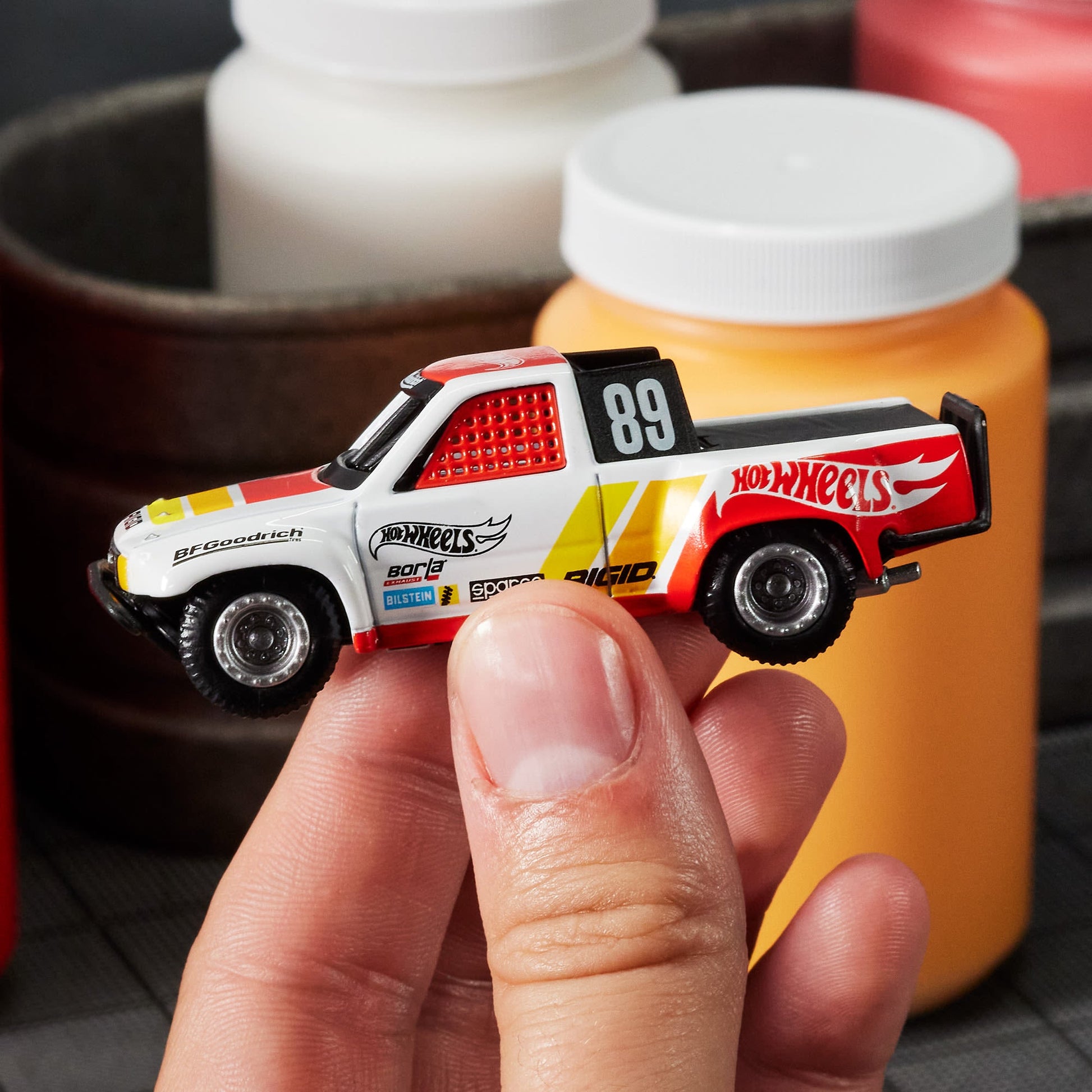 Hot Wheels Elite 64 1989 Toyota HiLux Stadium Truck - Xe Mô Hình Tỷ Lệ 1:64 Cao Cấp - Hot Wheels Hot Wheels - ảnh 1 - Xe mô h